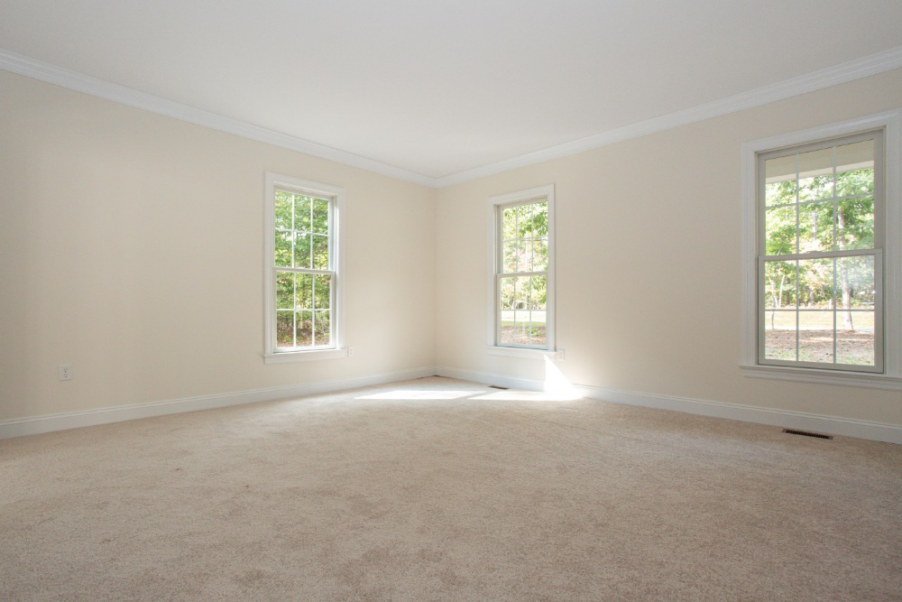 Empty room with large windows